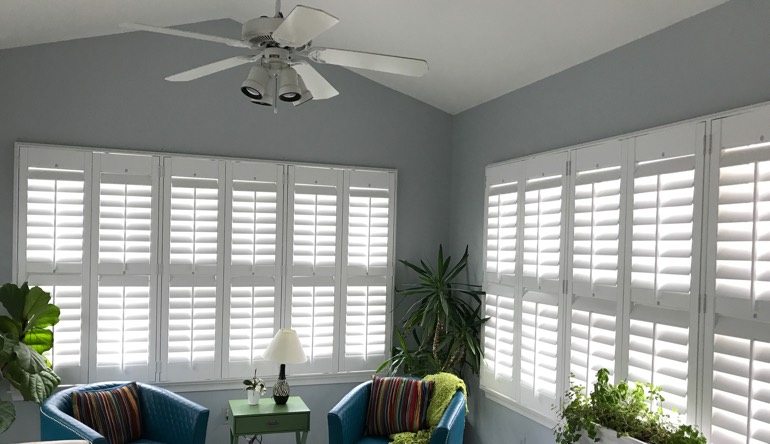 Salt Lake City sunroom with fan and shutters